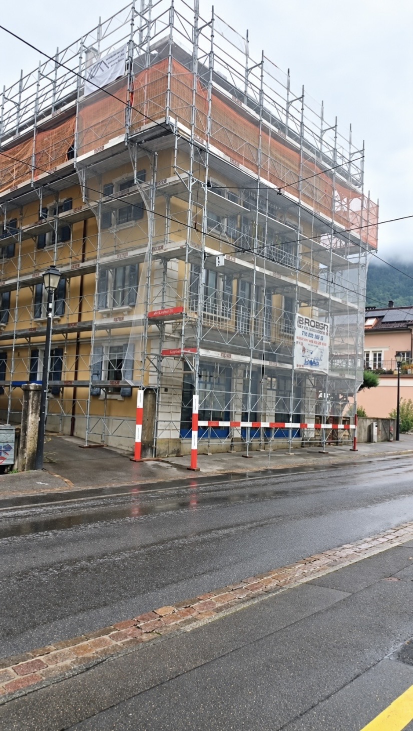 Scaffolded corner of the Rue Centrale residential building
